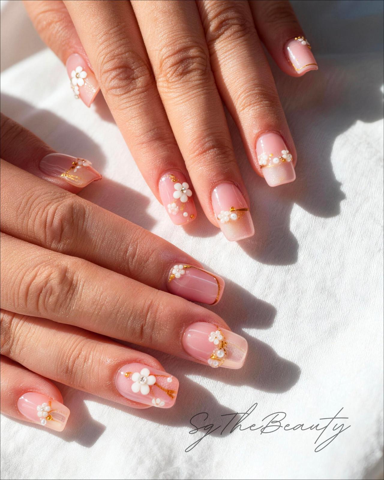 White floral pearl nails