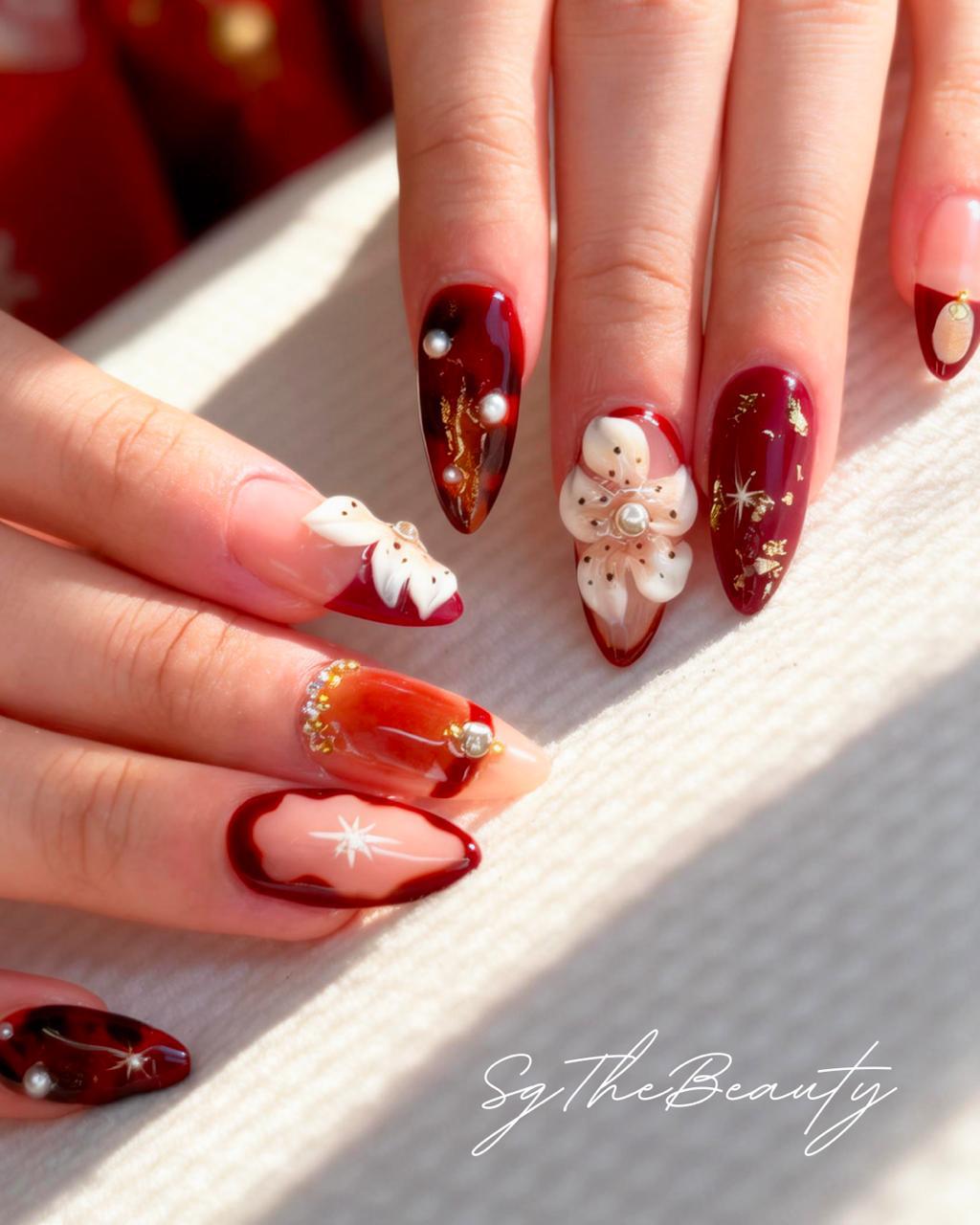 Burgundy floral nails